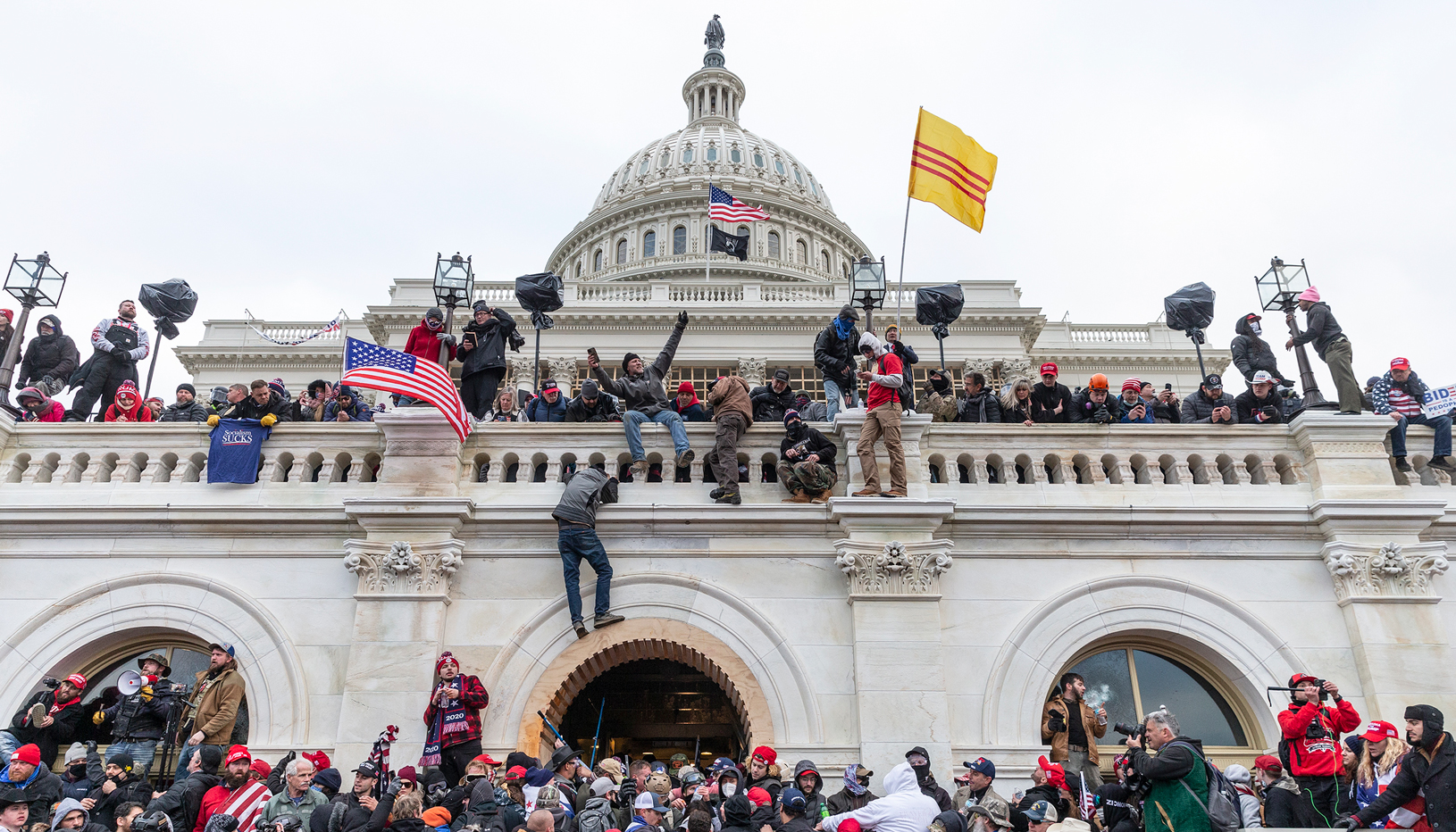 Pro-Trump rioters storm the Capitol.