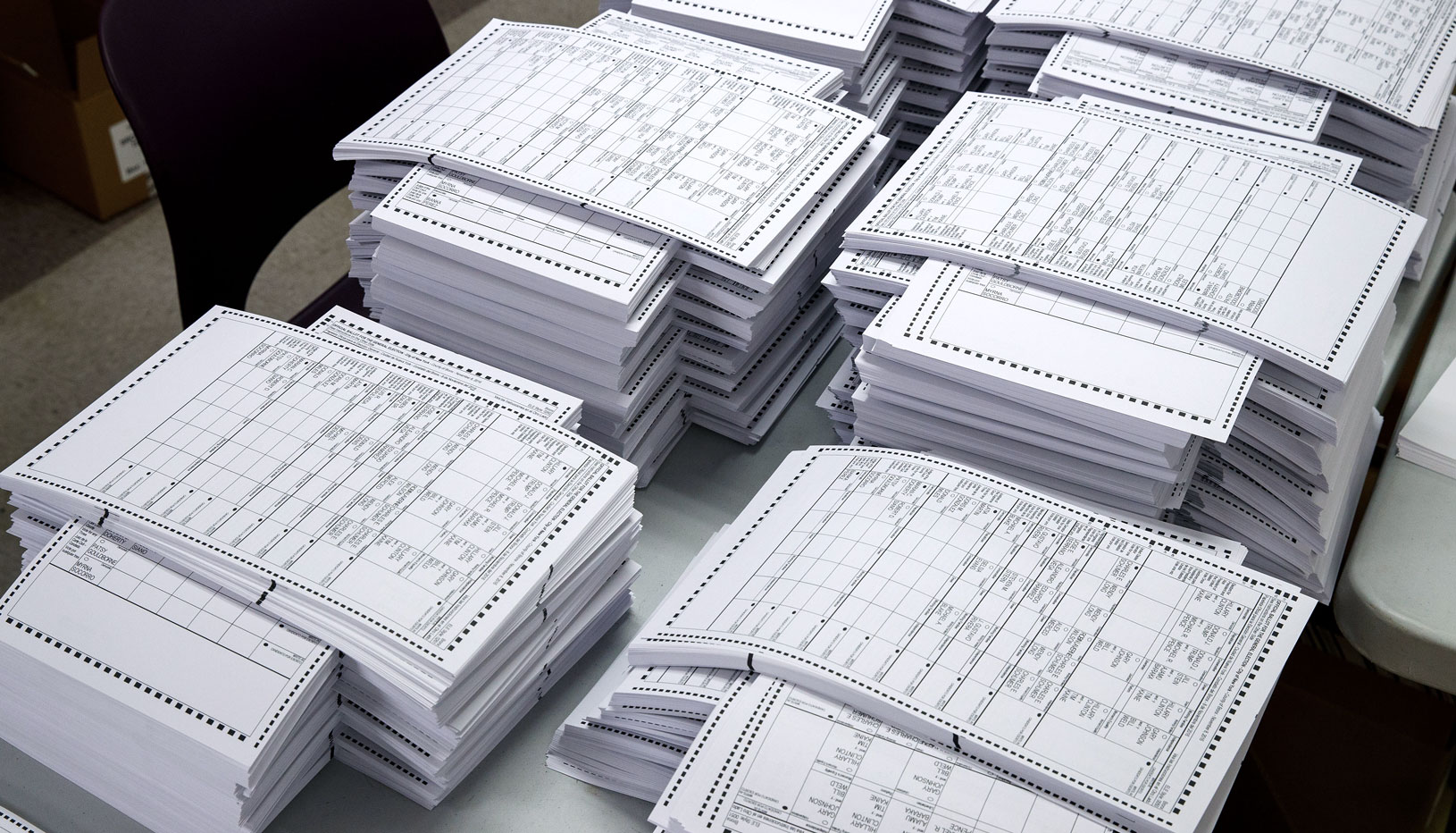 Stacks of paper ballots