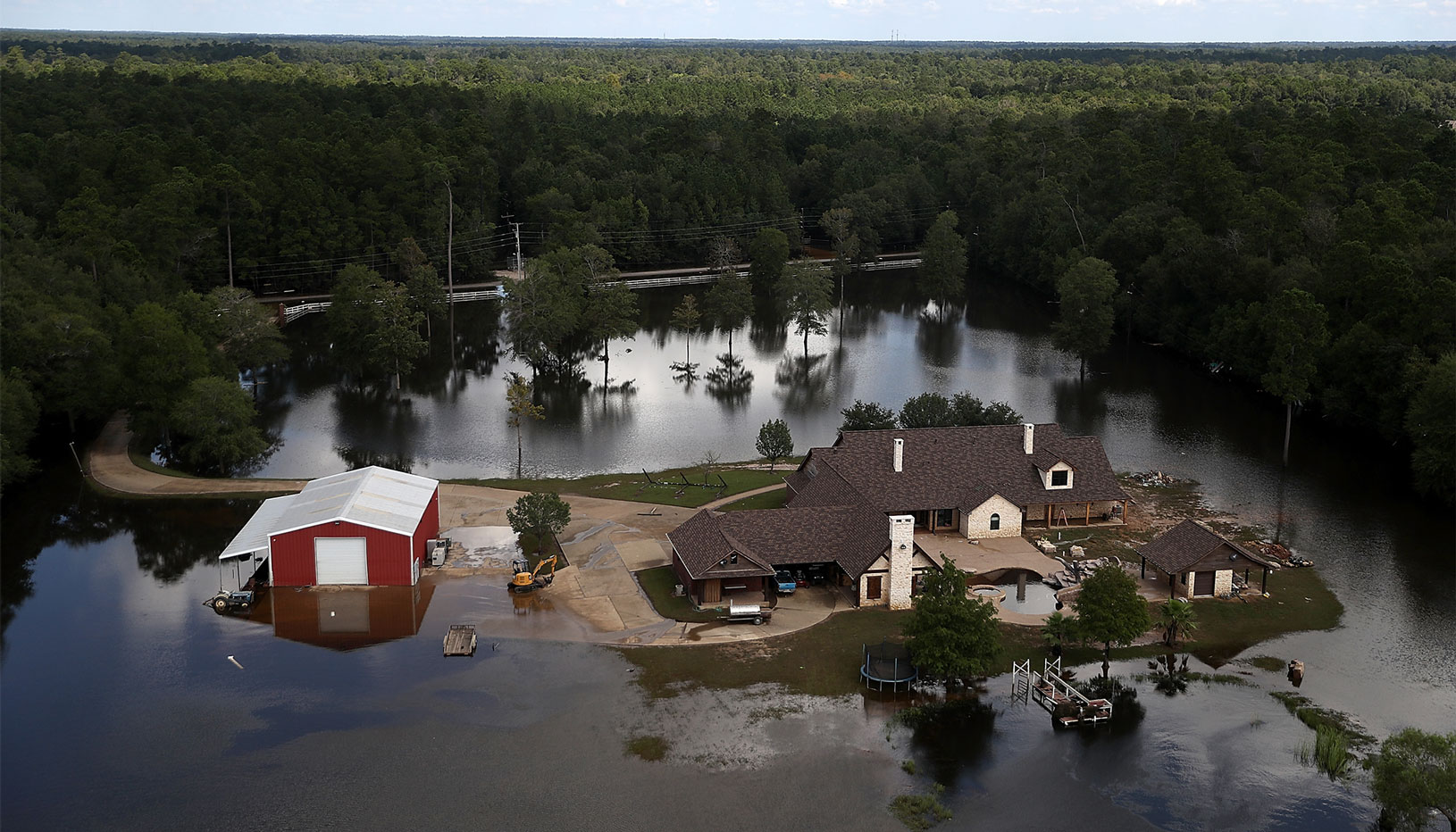 home in Texas surrounded by floodwaters