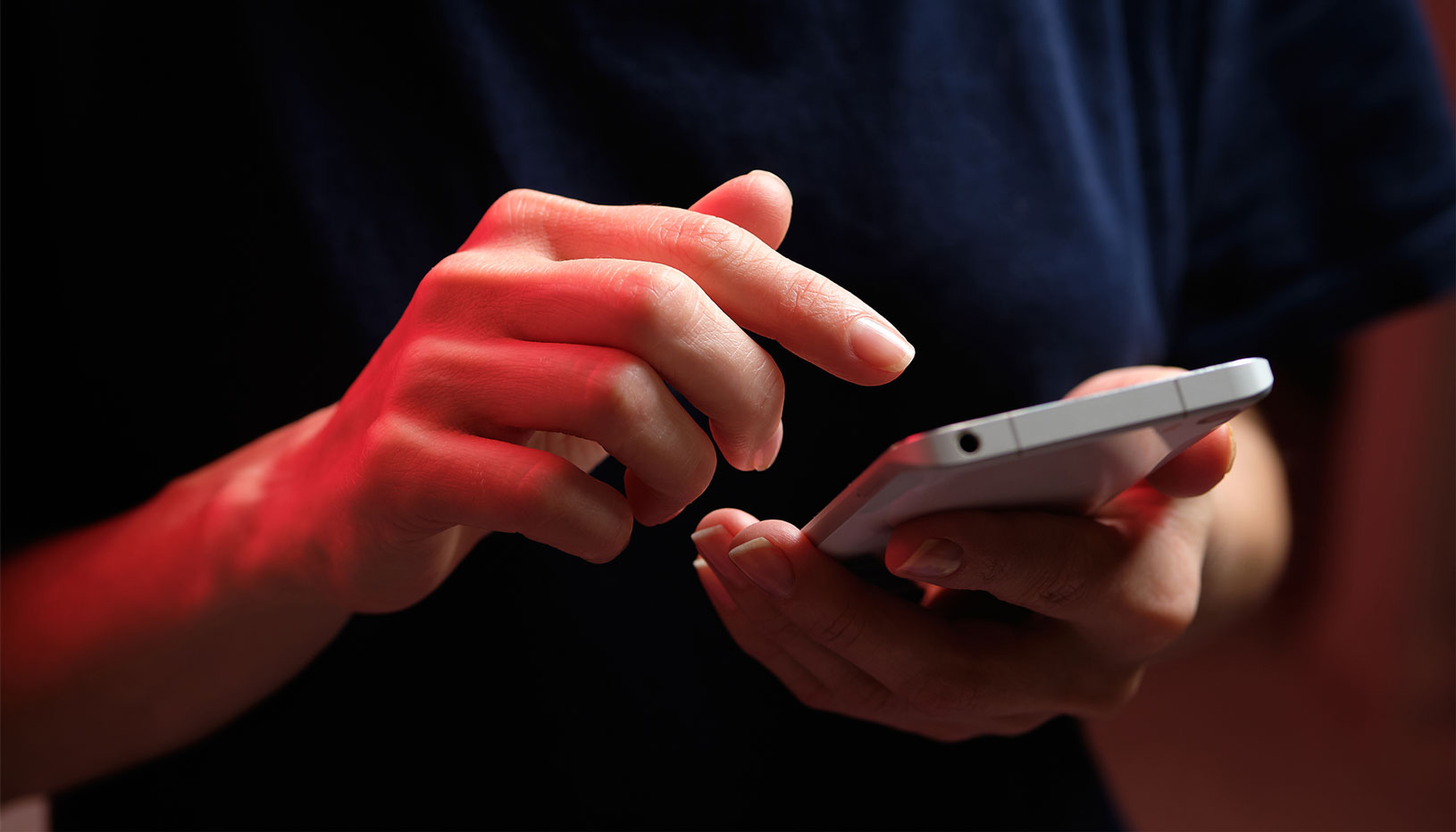 close-up of person texting