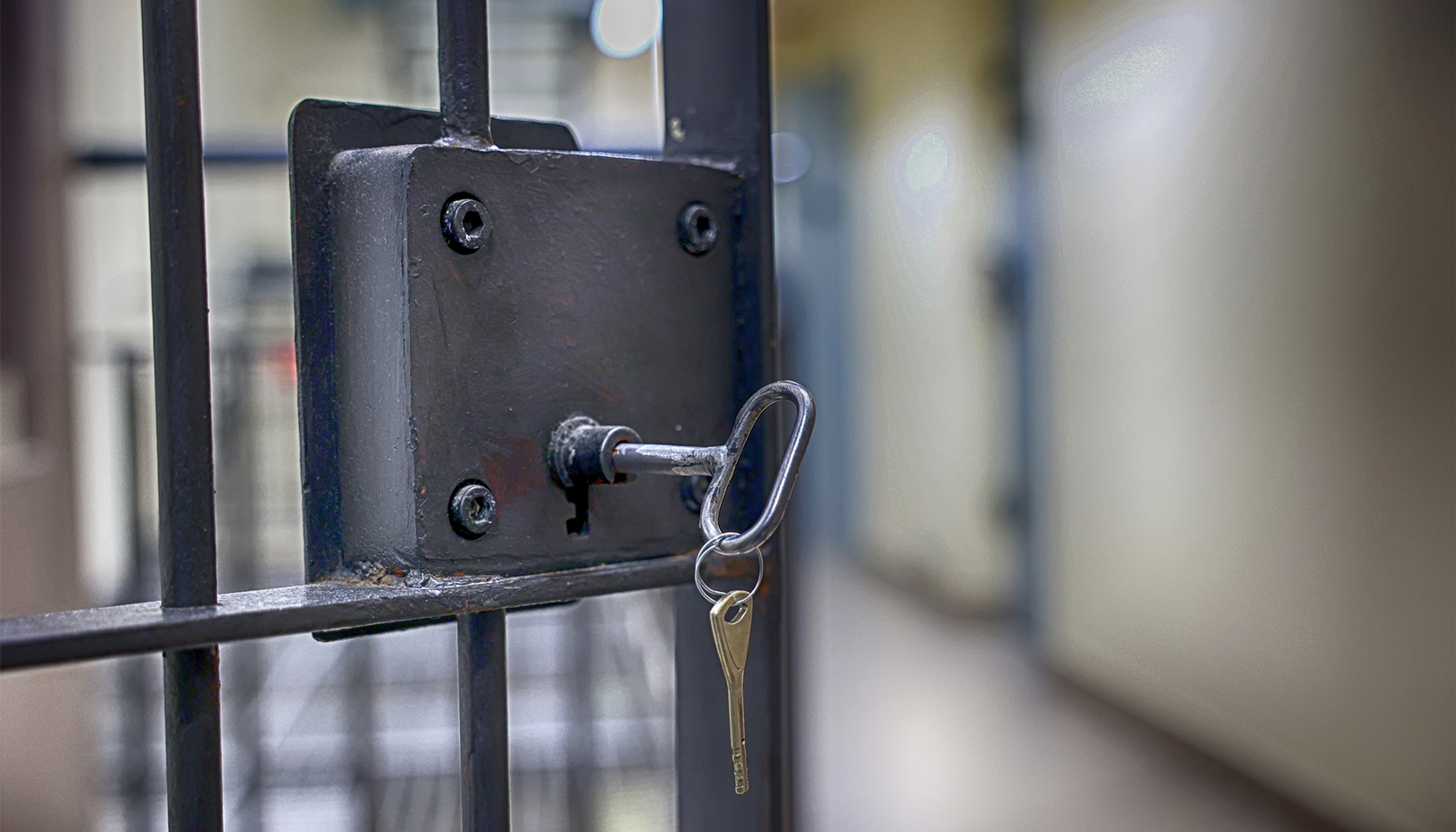 Jail cell with key in the lock