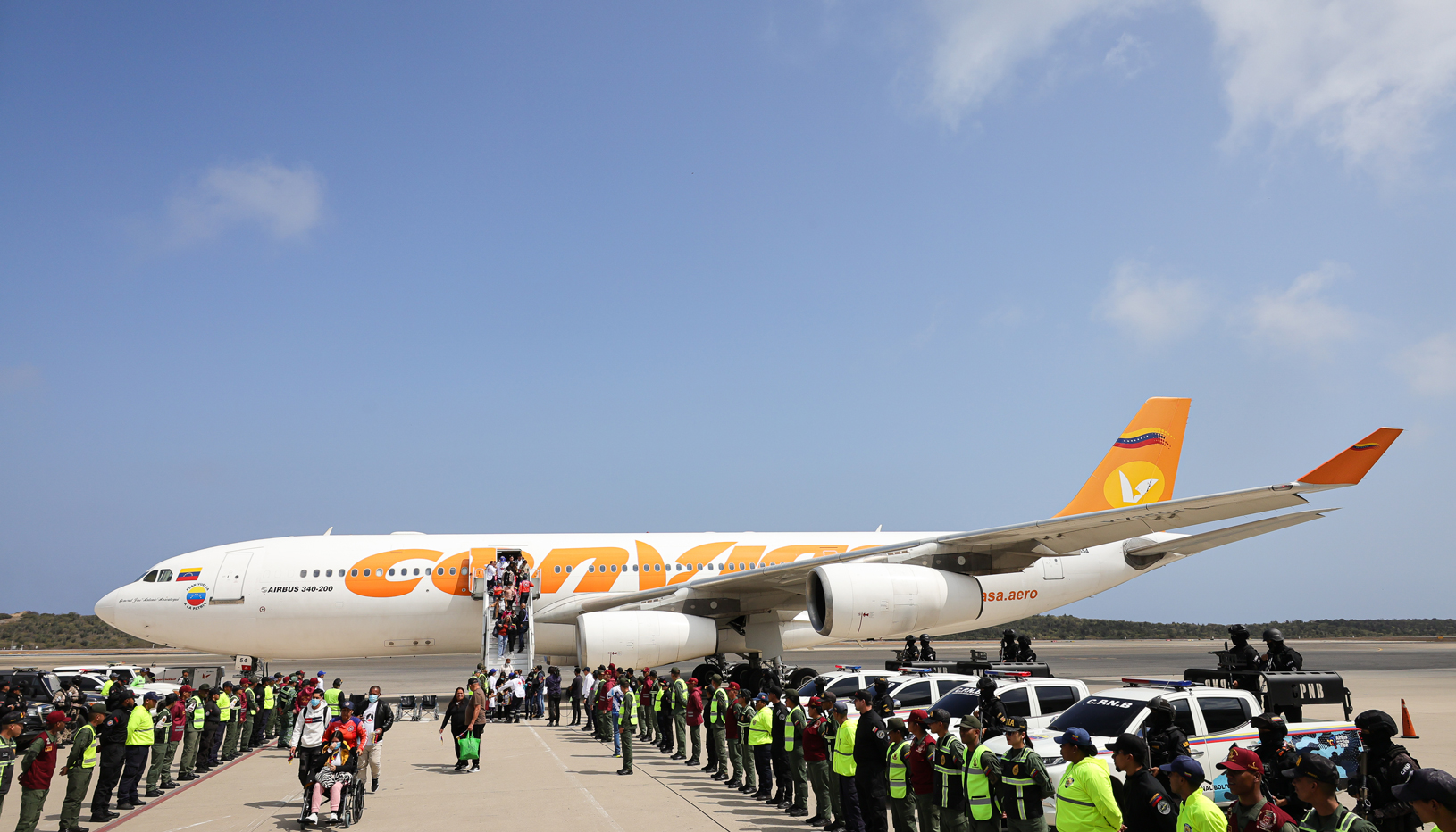 A plane carrying Venezuelans deported from the US to El Salvador