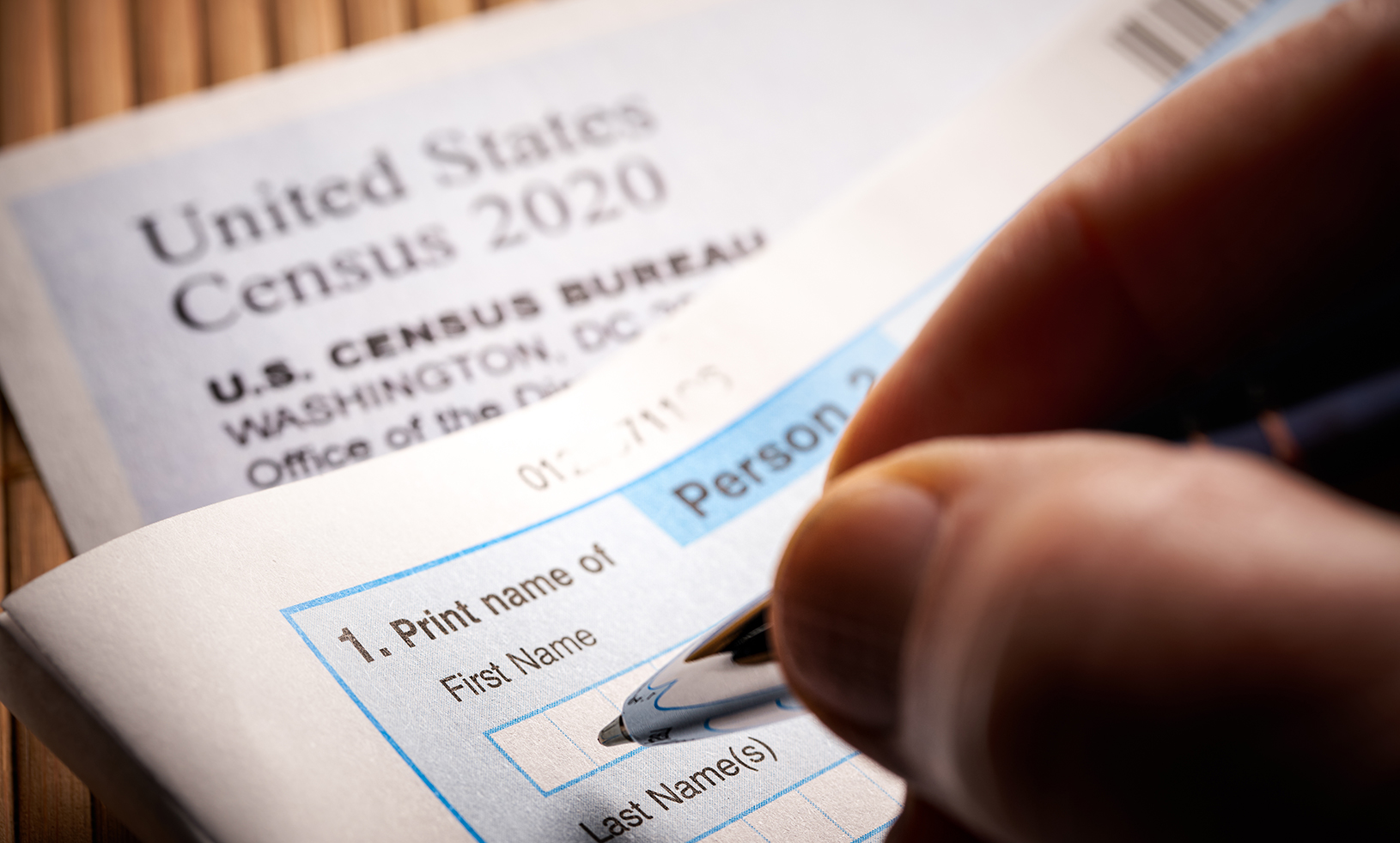 Person filling out census form