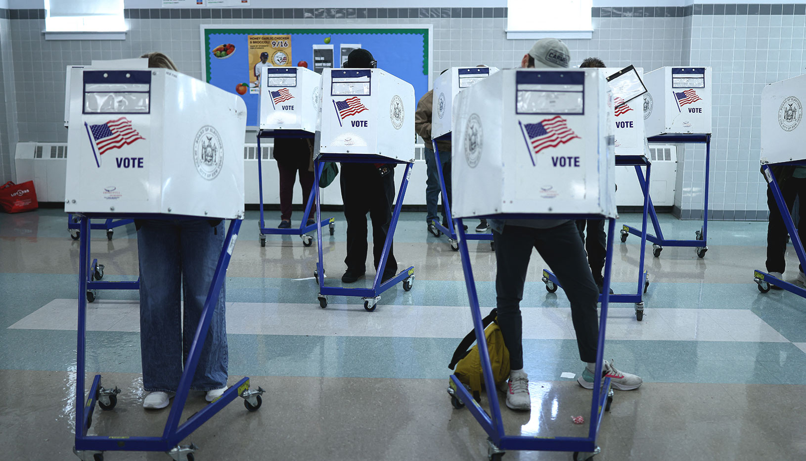 Voters at voting booths