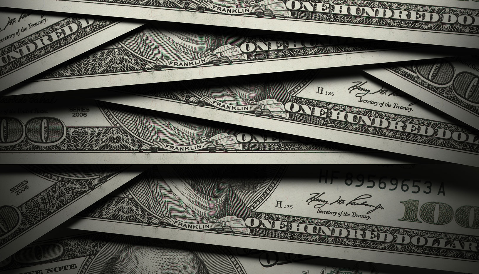 Scattered $100 bills