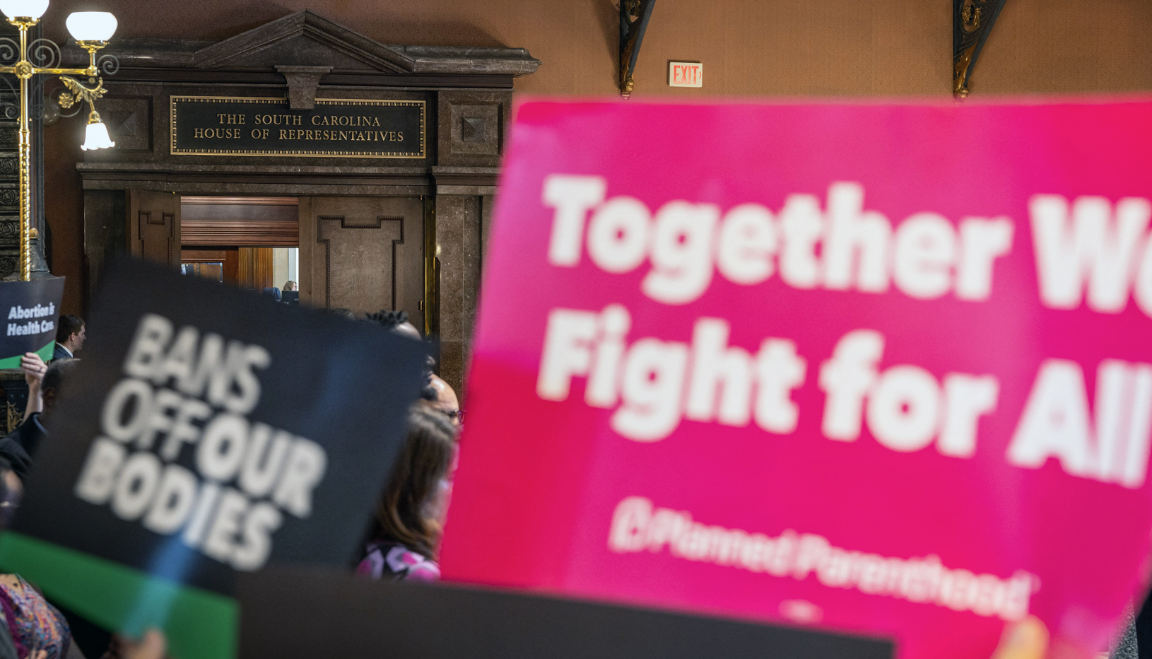 Abortion rights advocates and lawmakers hold a press conference before debate of a bill that would restrict abortions after six weeks, at the South Carolina State House in 2023. 