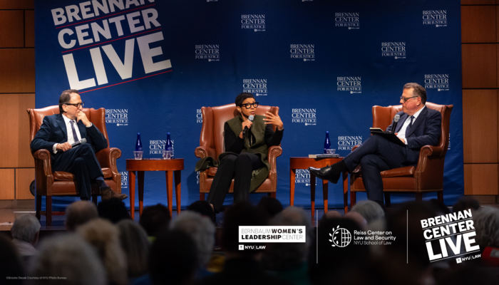 Photograph of speakers onstage