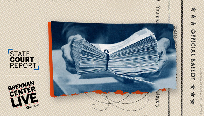 a stack of ballots being held