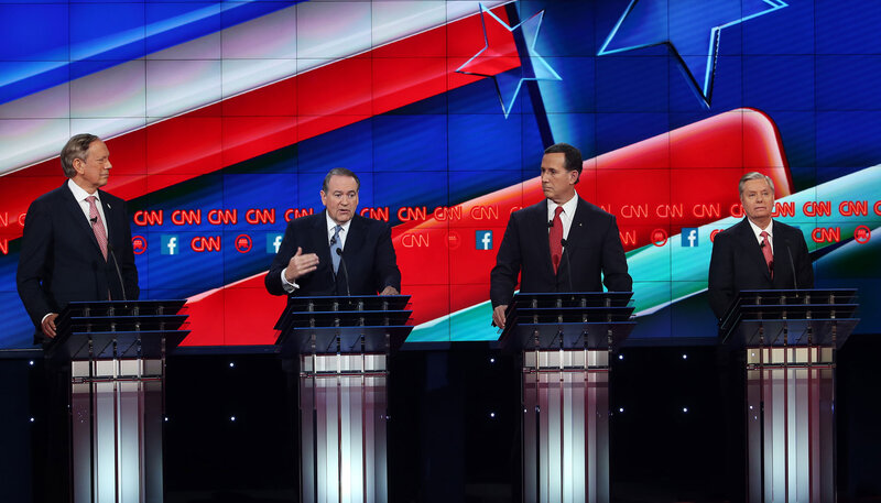 2016 Republican presidential candidates, from left: George Pataki, Mike Huckabee, Rick Santorum, and Lindsey Graham engage in a primary debate