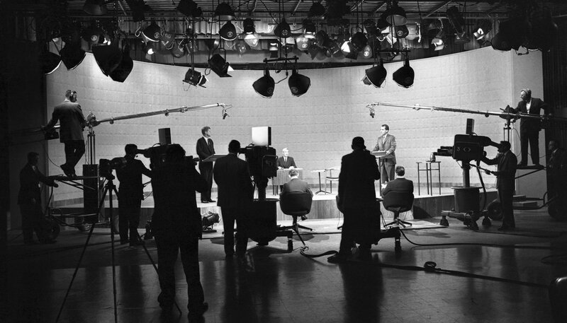 Image of TV studio where John F. Kennedy and Richard Nixon engage in a 1960 presidential debate