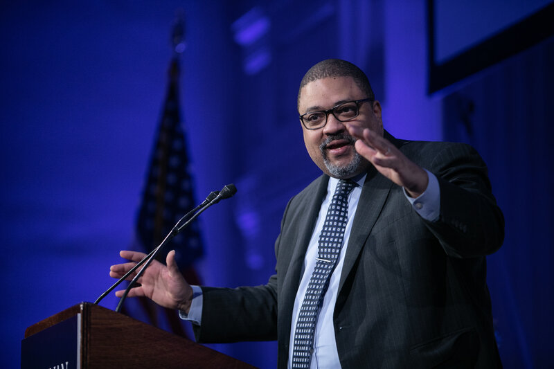 Alvin Bragg speaking at a podium