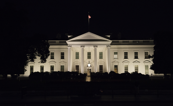 Photo of the White House at night