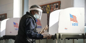 Voter in a voting booth