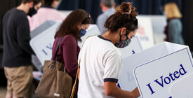 Voter casts ballot.