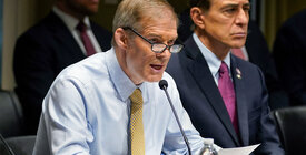 Rep. Jim Jordan speaking into a microphone