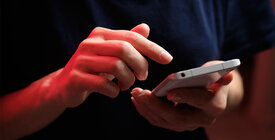 close-up of person texting