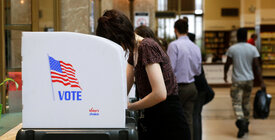 Voter in booth