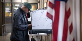 Person at a voting booth