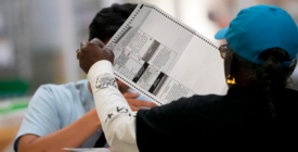 Person handling ballot