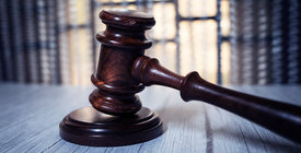 Gavel in front of window