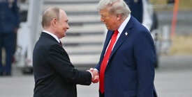 Trump and Putin shaking hands 