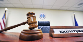 gavel with miltary judge sign