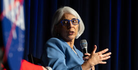 Dr. Arati Prabhakar speaking.