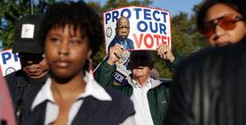 People marching in support of voting rights