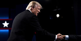 President Trump shaking hands with someone off-camera
