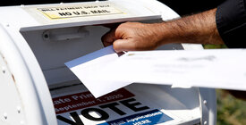 Person depositing a mail ballot