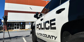 Fulton County police cruiser outside elections office