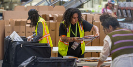 Election workers handling ballots