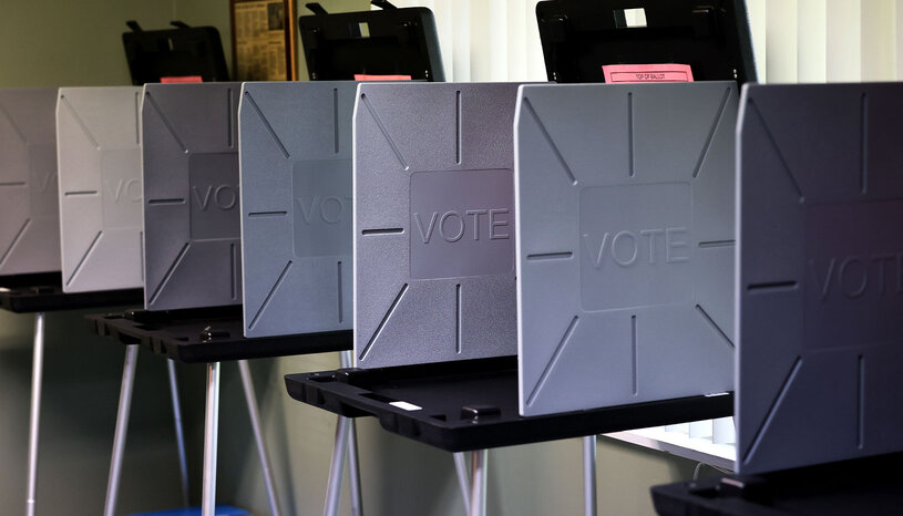 line of empty voting booths