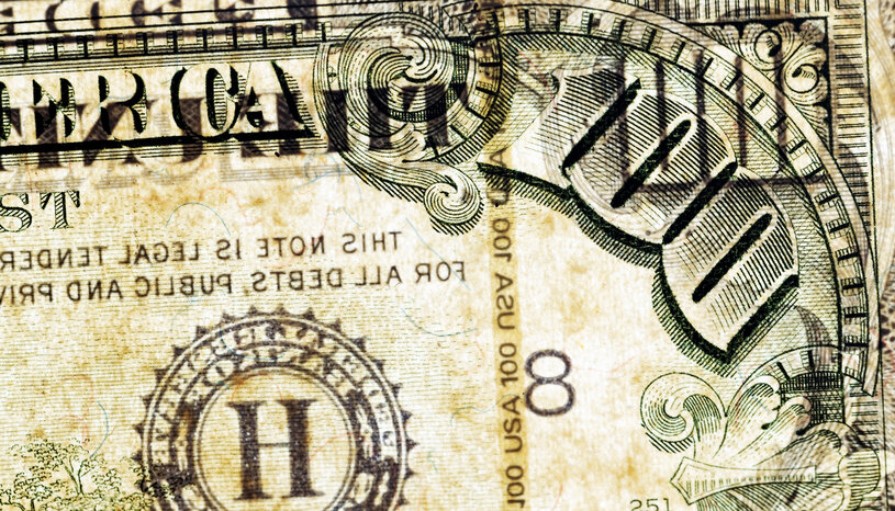 top right corner of $100 bill