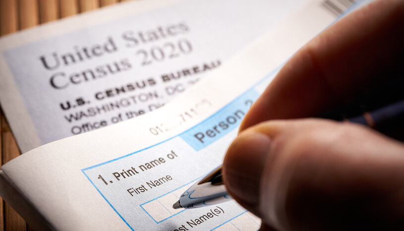Person filling out census form