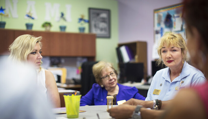 Three women sitting at a table