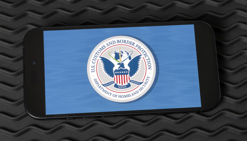 Graphic of DHS seal displayed on a smartphone screen