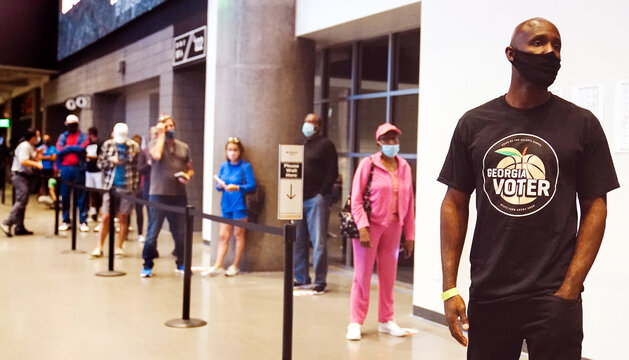 Citizens waiting in line to vote