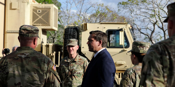 Florida governor Ron DeSantis speaking to National Guard troops