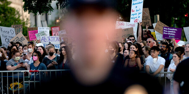 Abortion protest and police officer