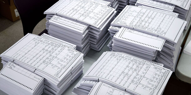 Stacks of paper ballots