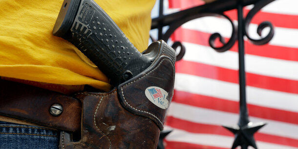 A holstered handgun