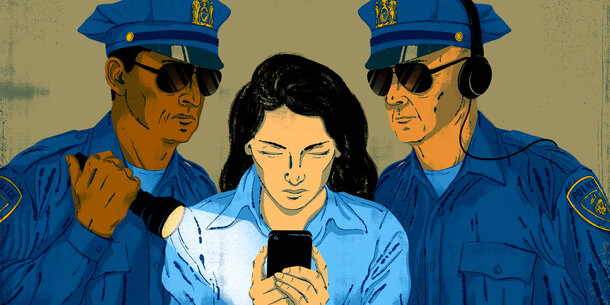 Two police officers watching a woman looking at her phone