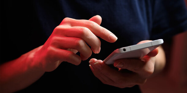 close-up of person texting