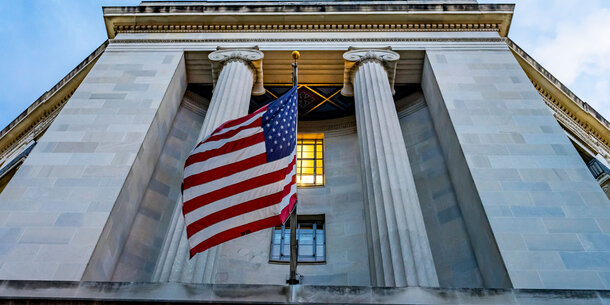 Justice Department and U.S. flag