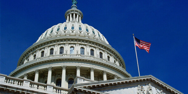 image of the outside of the U.S. Capitol dome, looking up from the ground