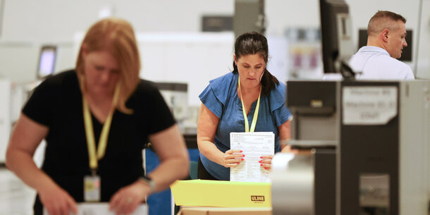 Election workers doing their jobs