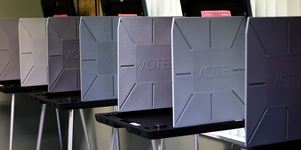 line of empty voting booths