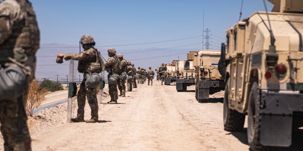 National Guard troops assisting a DEA drug raid in California