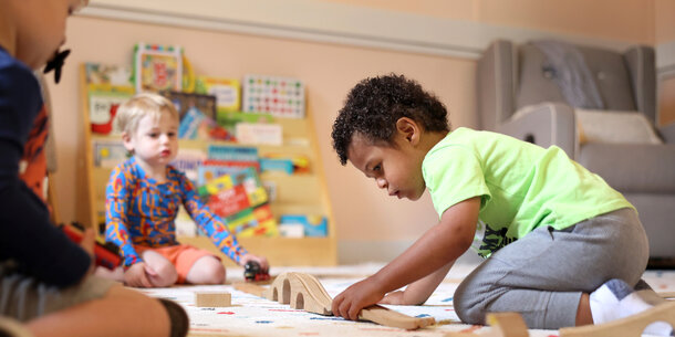 Children playing inside a daycare.